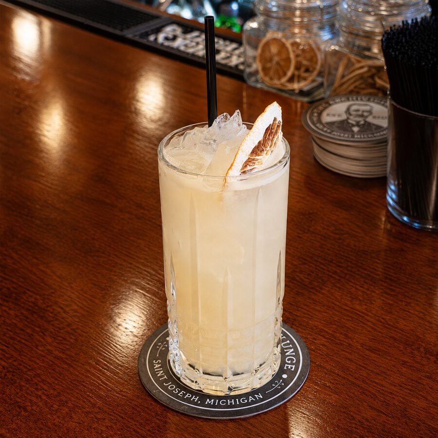 The Catacomb Collins cocktail at The Archive Lounge — Tom Collins