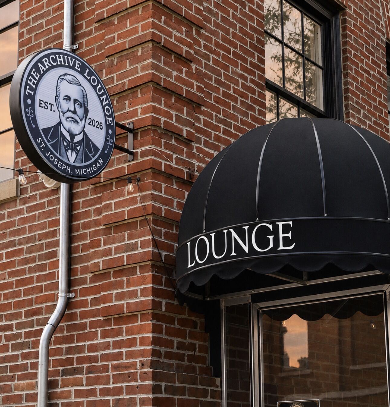 The Archive Lounge sign and awning on Main Street in downtown St. Joseph, Michigan